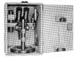 7. Stereomicroscope in its case 